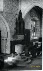 St. Andrew's Church Norman font and later font cover. For more information, history & recent photographs of St. Andrew's, please see the churches section of this web-site.